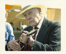 Shelton Farms founder Ethan Shelton playing music at Niles, MI Apple Festival